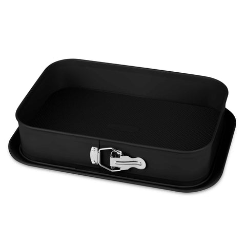 Product image of Rectangle springform 39x27cm. Part of the Matte Black Collection/Black Rose Collection . Features: • Material: carbon steel with non-stick titanPro coating • Size: 34,2*23,3*6,7 cm • Base size: 39*27 cm • Color: matt black. (Studio view). Official Berlinger Haus product, boosted by Promintra sl.