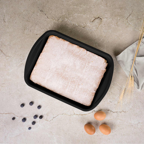 Product image of Oblong roaster 35x27cm. Part of the Leonardo Collection . Features: • Material: carbon steel with titanPro non-stick coating • Size: 35*27*6,5 cm • Color: matt bordeaux. (Studio view). Official Berlinger Haus product, boosted by Promintra sl.