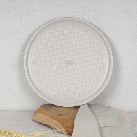 Product image of Pizza pan 36cm. Part of the Sahara Collection . Features: • Material: carbon steel with titanPro non-stick coating • Size: 36*1,1 cm • Color: matt cream. (Studio view). Official Berlinger Haus product, boosted by Promintra sl.