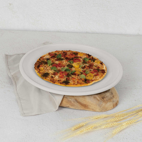 Product image of Pizza pan 36cm. Part of the Sahara Collection . Features: • Material: carbon steel with titanPro non-stick coating • Size: 36*1,1 cm • Color: matt cream. (Studio view). Official Berlinger Haus product, boosted by Promintra sl.
