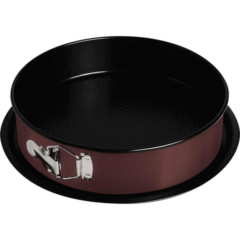 Product image of Round springform 26x6,8cm. Part of the Leonardo Collection . Features: • Material: carbon steel with titanPro non-stick coating • Size: 26*6,8 cm • Base size: Ø29,9 cm • Color: matt bordeaux. (Studio view). Official Berlinger Haus product, boosted by Promintra sl.
