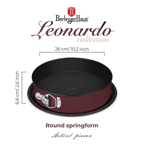 Product image of Round springform 26x6,8cm. Part of the Leonardo Collection . Features: • Material: carbon steel with titanPro non-stick coating • Size: 26*6,8 cm • Base size: Ø29,9 cm • Color: matt bordeaux. (Studio view). Official Berlinger Haus product, boosted by Promintra sl.