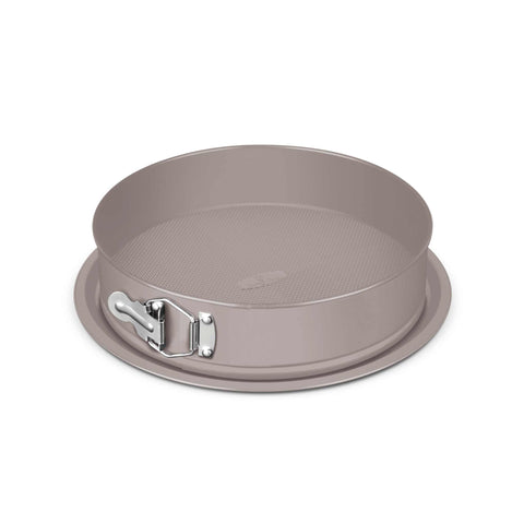 Product image of Round springform 26x6,8cm. Part of the Taupe Collection . Features: • Material: carbon steel with titanPro non-stick coating • Size: 26*6,8 cm • Base size: Ø29,9 cm • Color: matt taupe. (Studio view). Official Berlinger Haus product, boosted by Promintra sl.