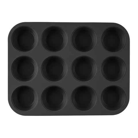 Product image of 12cups muffin pan. Part of the Matte Green Collection . Features: • Material: carbon steel with titanPro non-stick coating • Size: 35*26,5*3 cm • Color: matt green. (Studio view). Official Berlinger Haus product, boosted by Promintra sl.