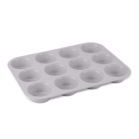 Product image of 12cups muffin pan. Part of the Taupe Collection . Features: • Material: carbon steel with titanPro non-stick coating • Size: 35*26,5*3 cm • Color: matt taupe. (Studio view). Official Berlinger Haus product, boosted by Promintra sl.