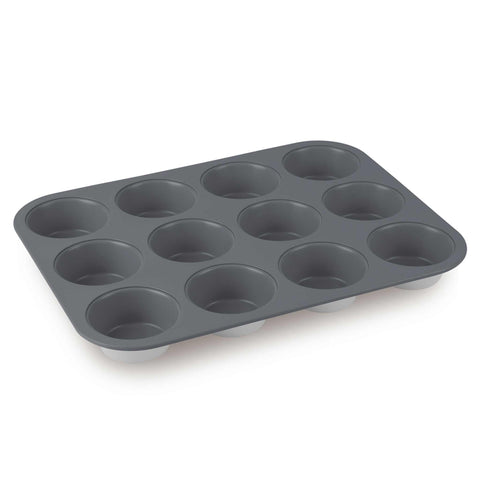 Product image of 12cups muffin pan. Part of the Aspen Collection . Features: • Material: carbon steel with titanPro non-stick coating • Size: 35*26,5*3 cm • Color: matt grey. (Studio view). Official Berlinger Haus product, boosted by Promintra sl.