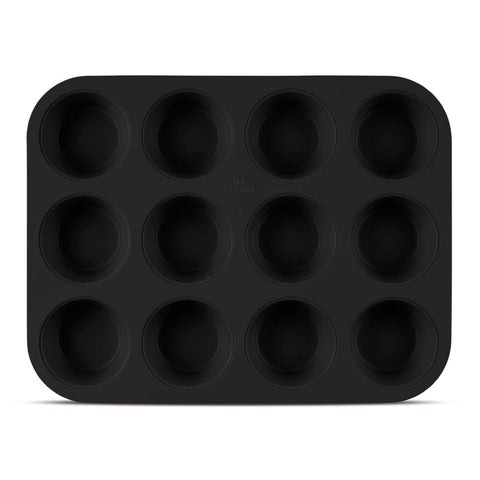Product image of 12cups muffin pan. Part of the Matte Black Collection/Black Rose Collection . Features: • Material: carbon steel with titanPro non-stick coating • Size: 35*26,5*3 cm • Color: matt black. (Studio view). Official Berlinger Haus product, boosted by Promintra sl.