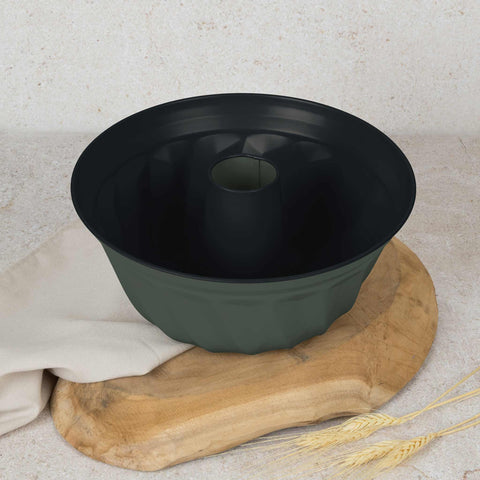 Product image of Bundt pan 25cm. Part of the Matte Green Collection . Features: • Material: carbon steel with titanPro non-stick coating • Size: 25*10,5 cm • Color: matt green. (Studio view). Official Berlinger Haus product, boosted by Promintra sl.