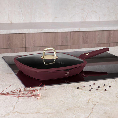 Product image of Grill pan with lid 28cm. Part of the Leonardo Collection . Features: • Material: forged aluminum with non-stick titanPro coating • Grill pan with lid Ø28*4,1 cm 2,1L • Color: matt bordeaux REGISTERED DESIGN BY BERLIN.... (Studio view). Official Berlinger Haus product, boosted by Promintra sl.