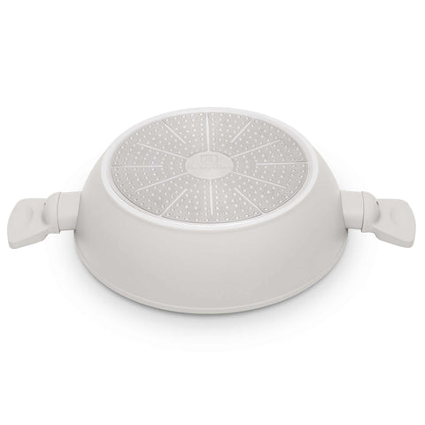 Product image of Shallow pot with lid 30cm. Part of the Sahara Collection . Features: • Material: forged aluminum with non-stick titanPro coating • Shallow pot with lid Ø30*8 cm 4,5L • Color: matt cream REGISTERED DESIGN BY BERLINGER.... (Studio view). Official Berlinger Haus product, boosted by Promintra sl.