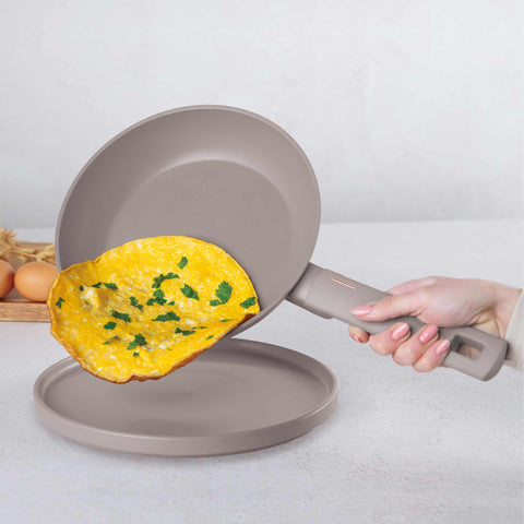 Product image of Frypan 24cm. Part of the Taupe Collection . Features: • Material: forged aluminum with non-stick titanPro coating • Frypan Ø24*4,8 cm 1,7L • Color: matt taupe REGISTERED DESIGN BY BERLINGER HAUS!. (Studio view). Official Berlinger Haus product, boosted by Promintra sl.