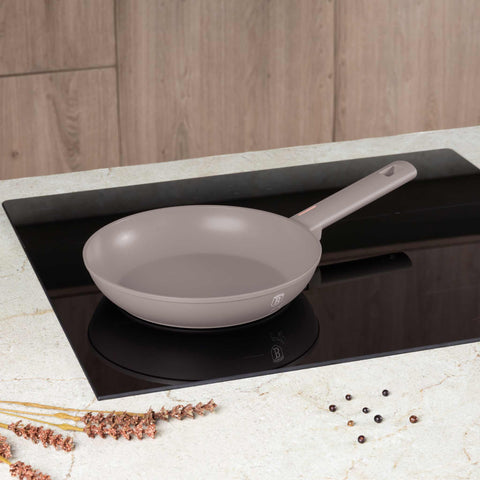 Product image of Frypan 24cm. Part of the Taupe Collection . Features: • Material: forged aluminum with non-stick titanPro coating • Frypan Ø24*4,8 cm 1,7L • Color: matt taupe REGISTERED DESIGN BY BERLINGER HAUS!. (Studio view). Official Berlinger Haus product, boosted by Promintra sl.
