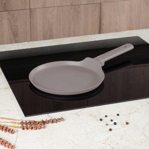 Product image of Pancake pan 25cm. Part of the Taupe Collection . Features: • Material: forged aluminum with non-stick titanPro coating • Pancake pan Ø25*1,5 cm • Color: matt taupe REGISTERED DESIGN BY BERLINGER HAUS!. (Studio view). Official Berlinger Haus product, boosted by Promintra sl.