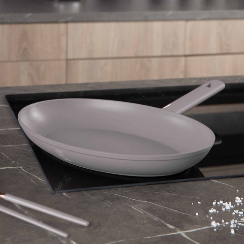Product image of Fish pan 35x25cm. Part of the Taupe Collection . Features: • Material: forged aluminum with non-stick titanPro coating • Fish pan Ø35*25*4,5 cm • Color: matt taupe REGISTERED DESIGN BY BERLINGER HAUS!. (Studio view). Official Berlinger Haus product, boosted by Promintra sl.