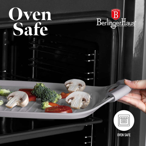 Product image of Grill plate 47cm. Part of the Taupe Collection . Features: • Material: forged aluminum with non-stick titanPro coating • Size: 47*29 cm • Color: matt taupe • FREE 2 PCS HEAT RESISTANT SILICONE HANDLE. (Studio view). Official Berlinger Haus product, boosted by Promintra sl.