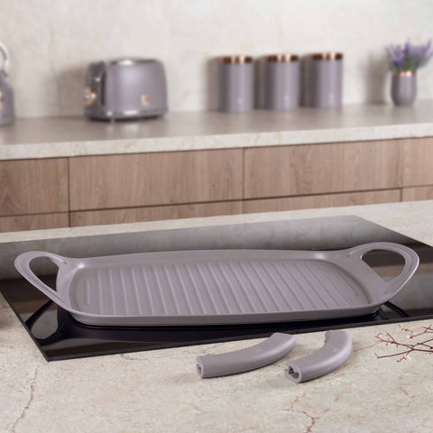 Product image of Grill plate 47cm. Part of the Taupe Collection . Features: • Material: forged aluminum with non-stick titanPro coating • Size: 47*29 cm • Color: matt taupe • FREE 2 PCS HEAT RESISTANT SILICONE HANDLE. (Studio view). Official Berlinger Haus product, boosted by Promintra sl.