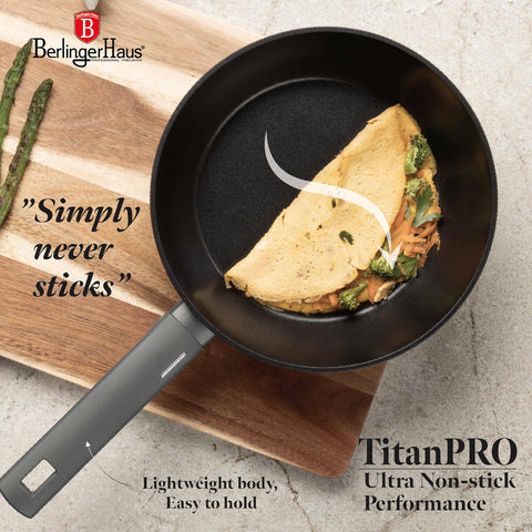 Product image of Deep frypan with lid 24cm. Part of the Anthracite Collection . Features: • Material: forged aluminum with non-stick titanPro coating • Deep frypan with lid Ø24*6,5 cm 2,3L • Color: matt anthracite REGISTERED DESIGN BY BE.... (Studio view). Official Berlinger Haus product, boosted by Promintra sl.