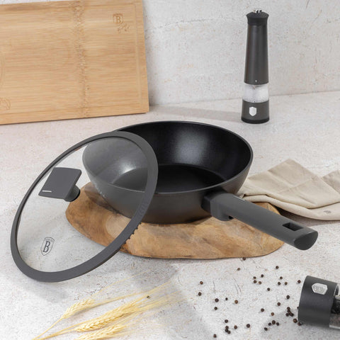 Product image of Deep frypan with lid 24cm. Part of the Anthracite Collection . Features: • Material: forged aluminum with non-stick titanPro coating • Deep frypan with lid Ø24*6,5 cm 2,3L • Color: matt anthracite REGISTERED DESIGN BY BE.... (Studio view). Official Berlinger Haus product, boosted by Promintra sl.