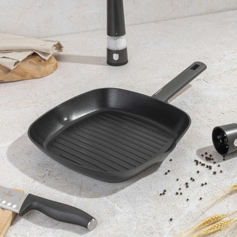 Product image of Grill pan 28cm. Part of the Anthracite Collection . Features: • Material: forged aluminum with non-stick titanPro coating • Grill pan Ø28*4,1 cm 2,1L • Color: matt anthracite REGISTERED DESIGN BY BERLINGER HAUS!. (Studio view). Official Berlinger Haus product, boosted by Promintra sl.