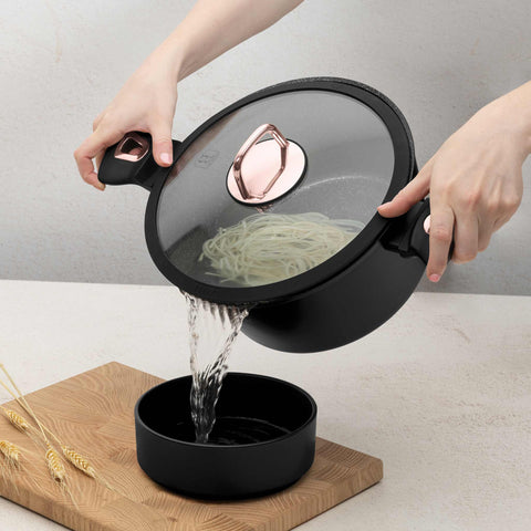 Product image of Casserole with lid 24cm. Part of the Black Rose Collection . Features: • Material: forged aluminum • Casserole with lid Ø24*11,8 cm 4,1 L • Color: matt black- rose gold REGISTERED DESIGN BY BERLINGER HAUS!. (Studio view). Official Berlinger Haus product, boosted by Promintra sl.