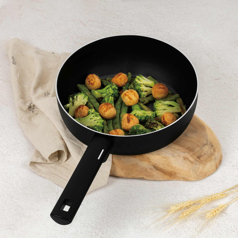 Product image of Flip frypan 26cm. Part of the Matte Black Collection . Features: • Material: stamp aluminum with non-stick titanPro coating • Flip frypan Ø26 cm 2,8L • Color: black- silver REGISTERED DESIGN BY BERLINGER HAUS!. (Studio view). Official Berlinger Haus product, boosted by Promintra sl.
