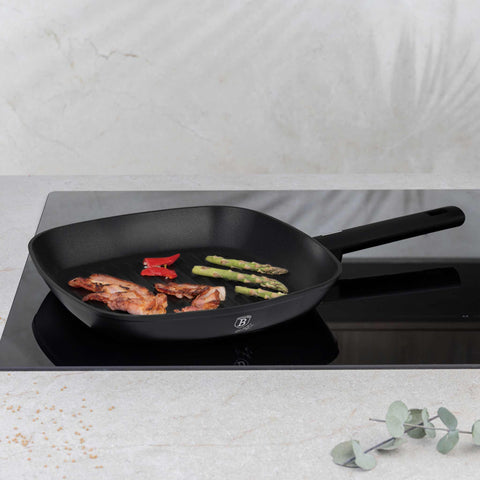 Product image of Grill pan 28cm. Part of the Matte Black Collection . Features: • Material: forged aluminum with non-stick titanPro coating • Grill pan Ø28*4,1 cm 2,1L • Color: black- silver REGISTERED DESIGN BY BERLINGER HAUS!. (Studio view). Official Berlinger Haus product, boosted by Promintra sl.