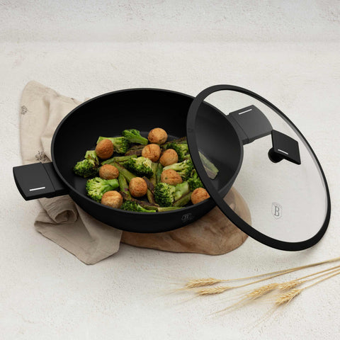 Product image of Shallow pot with lid 30cm. Part of the Matte Black Collection . Features: • Material: forged aluminum with non-stick titanPro coating • Shallow pot with lid Ø30*8 cm 4,5L • Color: black- silver REGISTERED DESIGN BY BERLIN.... (Studio view). Official Berlinger Haus product, boosted by Promintra sl.