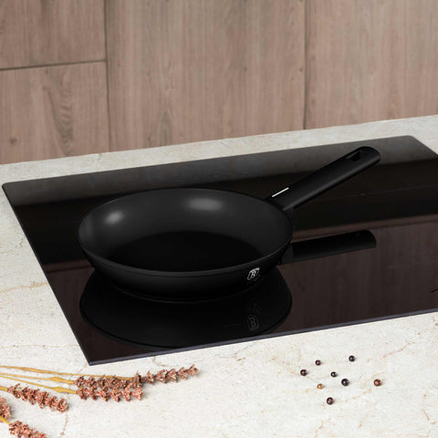 Product image of 3pcs frypan set. Part of the Matte Black Collection . Features: • Material: forged aluminum with non-stick titanPro coating • Include: • Frypan Ø20*4,2 cm 1,0L • Frypan Ø24*5 cm 1,7L • Grill pan Ø28*4,1 cm 2,1L .... (Studio view). Official Berlinger Haus product, boosted by Promintra sl.