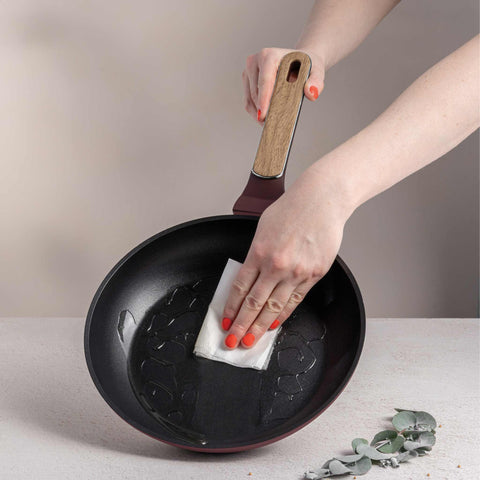 Product image of Frypan 24cm. Part of the Leonardo Nordic Collection . Features: • Material: forged aluminum with non-stick titanPro coating • Frypan Ø24*4,8 cm 1,7L • Color: matt bordeaux, wooden REGISTERED DESIGN BY BERLINGER .... (Studio view). Official Berlinger Haus product, boosted by Promintra sl.