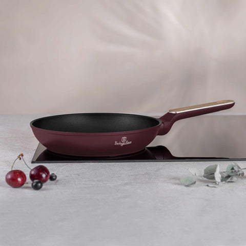 Product image of Frypan 24cm. Part of the Leonardo Nordic Collection . Features: • Material: forged aluminum with non-stick titanPro coating • Frypan Ø24*4,8 cm 1,7L • Color: matt bordeaux, wooden REGISTERED DESIGN BY BERLINGER .... (Studio view). Official Berlinger Haus product, boosted by Promintra sl.