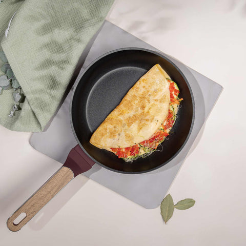 Product image of Frypan 24cm. Part of the Leonardo Nordic Collection . Features: • Material: forged aluminum with non-stick titanPro coating • Frypan Ø24*4,8 cm 1,7L • Color: matt bordeaux, wooden REGISTERED DESIGN BY BERLINGER .... (Studio view). Official Berlinger Haus product, boosted by Promintra sl.