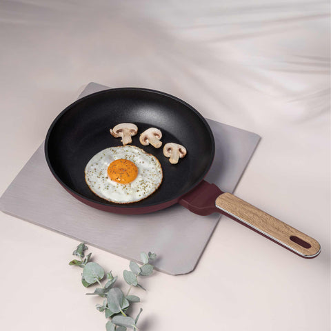 Product image of Frypan 24cm. Part of the Leonardo Nordic Collection . Features: • Material: forged aluminum with non-stick titanPro coating • Frypan Ø24*4,8 cm 1,7L • Color: matt bordeaux, wooden REGISTERED DESIGN BY BERLINGER .... (Studio view). Official Berlinger Haus product, boosted by Promintra sl.