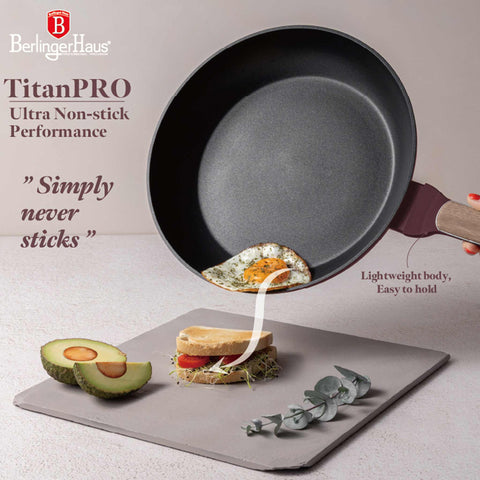 Product image of Frypan 28cm. Part of the Leonardo Nordic Collection . Features: • Material: forged aluminum with non-stick titanPro coating • Frypan Ø28*5,2 cm 2,4L • Color: matt bordeaux, wooden REGISTERED DESIGN BY BERLINGER .... (Studio view). Official Berlinger Haus product, boosted by Promintra sl.