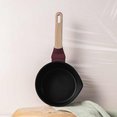 Product image of Sauce pan with lid 16cm. Part of the Leonardo Nordic Collection . Features: • Material: forged aluminum with non-stick titanPro coating • Sauce pan Ø16*7,5 cm 1,2L • Color: matt bordeaux, wooden REGISTERED DESIGN BY BERLING.... (Studio view). Official Berlinger Haus product, boosted by Promintra sl.