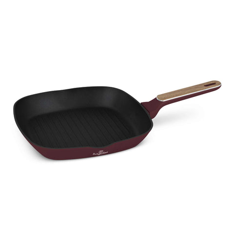Product image of Grill pan 28cm. Part of the Leonardo Nordic Collection . Features: • Material: forged aluminum with non-stick titanPro coating • Grill pan Ø28*4,1 cm 2,1L • Color: matt bordeaux, wooden REGISTERED DESIGN BY BERLING.... (Studio view). Official Berlinger Haus product, boosted by Promintra sl.