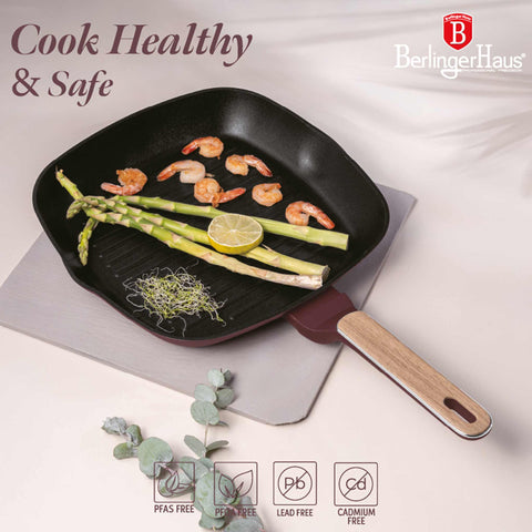 Product image of Grill pan 28cm. Part of the Leonardo Nordic Collection . Features: • Material: forged aluminum with non-stick titanPro coating • Grill pan Ø28*4,1 cm 2,1L • Color: matt bordeaux, wooden REGISTERED DESIGN BY BERLING.... (Studio view). Official Berlinger Haus product, boosted by Promintra sl.