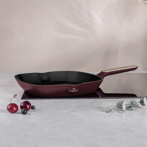 Product image of Grill pan 28cm. Part of the Leonardo Nordic Collection . Features: • Material: forged aluminum with non-stick titanPro coating • Grill pan Ø28*4,1 cm 2,1L • Color: matt bordeaux, wooden REGISTERED DESIGN BY BERLING.... (Studio view). Official Berlinger Haus product, boosted by Promintra sl.