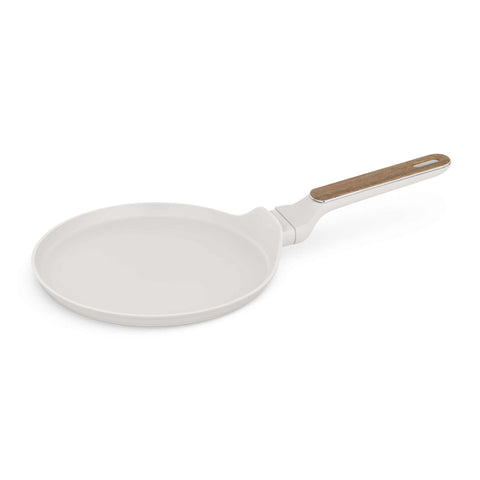 Product image of Pancake pan 25cm. Part of the Sahara Nordic Collection . Features: • Material: forged aluminum with non-stick titanPro coating • Pancake pan Ø25*2,2 cm • Color: matt cream, wooden REGISTERED DESIGN BY BERLINGER HAUS!. (Studio view). Official Berlinger Haus product, boosted by Promintra sl.