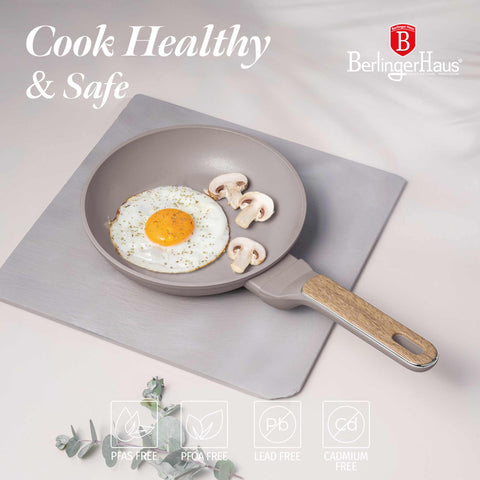 Product image of Frypan 20cm. Part of the Taupe Nordic Collection . Features: • Material: forged aluminum with non-stick titanPro coating • Frypan Ø20*4,5 cm 1,0L • Color: matt taupe, wooden REGISTERED DESIGN BY BERLINGER HAUS!. (Studio view). Official Berlinger Haus product, boosted by Promintra sl.