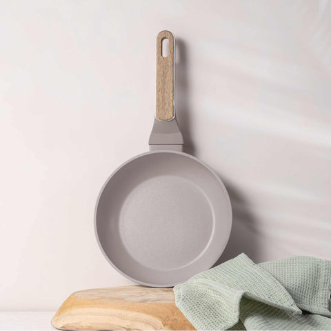 Product image of Frypan 20cm. Part of the Taupe Nordic Collection . Features: • Material: forged aluminum with non-stick titanPro coating • Frypan Ø20*4,5 cm 1,0L • Color: matt taupe, wooden REGISTERED DESIGN BY BERLINGER HAUS!. (Studio view). Official Berlinger Haus product, boosted by Promintra sl.