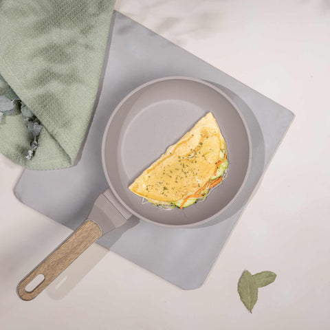 Product image of Frypan 20cm. Part of the Taupe Nordic Collection . Features: • Material: forged aluminum with non-stick titanPro coating • Frypan Ø20*4,5 cm 1,0L • Color: matt taupe, wooden REGISTERED DESIGN BY BERLINGER HAUS!. (Studio view). Official Berlinger Haus product, boosted by Promintra sl.
