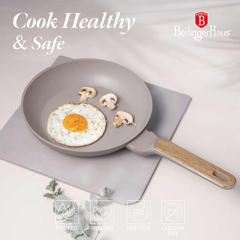 Product image of Frypan 24cm. Part of the Taupe Nordic Collection . Features: • Material: forged aluminum with non-stick titanPro coating • Frypan Ø24*4,8 cm 1,7L • Color: matt taupe, wooden REGISTERED DESIGN BY BERLINGER HAUS!. (Studio view). Official Berlinger Haus product, boosted by Promintra sl.