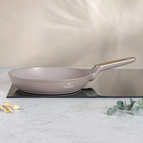 Product image of Frypan 24cm. Part of the Taupe Nordic Collection . Features: • Material: forged aluminum with non-stick titanPro coating • Frypan Ø24*4,8 cm 1,7L • Color: matt taupe, wooden REGISTERED DESIGN BY BERLINGER HAUS!. (Studio view). Official Berlinger Haus product, boosted by Promintra sl.