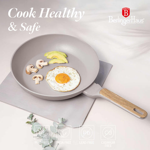 Product image of Frypan 28cm. Part of the Taupe Nordic Collection . Features: • Material: forged aluminum with non-stick titanPro coating • Frypan Ø28*5,2 cm 2,4L • Color: matt taupe, wooden REGISTERED DESIGN BY BERLINGER HAUS!. (Studio view). Official Berlinger Haus product, boosted by Promintra sl.