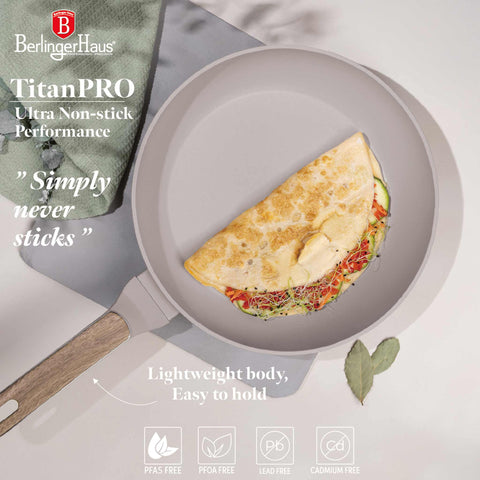 Product image of Frypan 28cm. Part of the Taupe Nordic Collection . Features: • Material: forged aluminum with non-stick titanPro coating • Frypan Ø28*5,2 cm 2,4L • Color: matt taupe, wooden REGISTERED DESIGN BY BERLINGER HAUS!. (Studio view). Official Berlinger Haus product, boosted by Promintra sl.