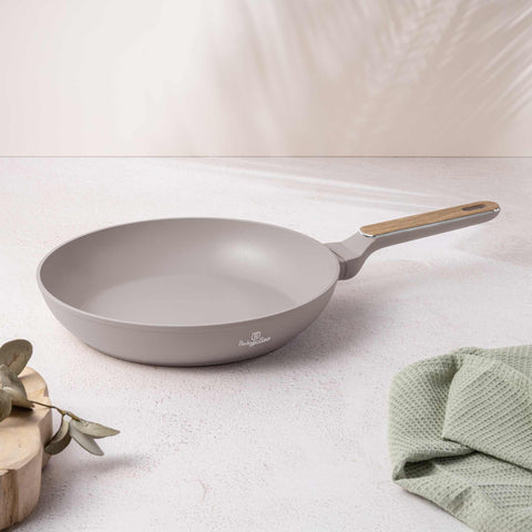 Product image of Frypan 28cm. Part of the Taupe Nordic Collection . Features: • Material: forged aluminum with non-stick titanPro coating • Frypan Ø28*5,2 cm 2,4L • Color: matt taupe, wooden REGISTERED DESIGN BY BERLINGER HAUS!. (Studio view). Official Berlinger Haus product, boosted by Promintra sl.