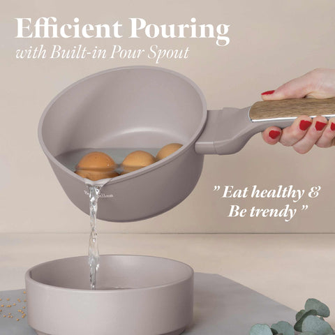 Product image of Sauce pan 16cm. Part of the Taupe Nordic Collection . Features: • Material: forged aluminum with non-stick titanPro coating • Sauce pan Ø16*7,5 cm 1,2L • Color: matt taupe, wooden REGISTERED DESIGN BY BERLINGER .... (Studio view). Official Berlinger Haus product, boosted by Promintra sl.