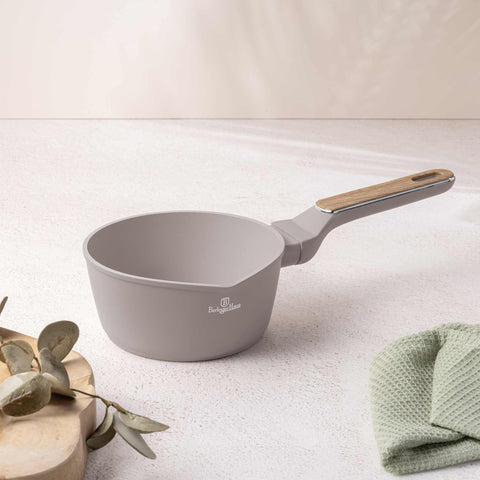 Product image of Sauce pan 16cm. Part of the Taupe Nordic Collection . Features: • Material: forged aluminum with non-stick titanPro coating • Sauce pan Ø16*7,5 cm 1,2L • Color: matt taupe, wooden REGISTERED DESIGN BY BERLINGER .... (Studio view). Official Berlinger Haus product, boosted by Promintra sl.