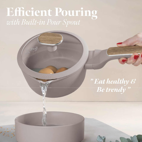 Product image of Sauce pan with lid 16cm. Part of the Taupe Nordic Collection . Features: • Material: forged aluminum with non-stick titanPro coating • Sauce pan Ø16*7,5 cm 1,2L • Color: matt taupe, wooden REGISTERED DESIGN BY BERLINGER .... (Studio view). Official Berlinger Haus product, boosted by Promintra sl.