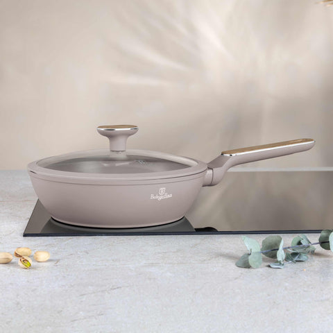 Product image of Deep frypan with lid 24cm. Part of the Taupe Nordic Collection . Features: • Material: forged aluminum with non-stick titanPro coating • Deep frypan with lid Ø24*6,5 cm 2,3L • Color: matt taupe, wooden REGISTERED DESIGN BY.... (Studio view). Official Berlinger Haus product, boosted by Promintra sl.